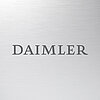 Daimler Logo auf Metallhintergrund